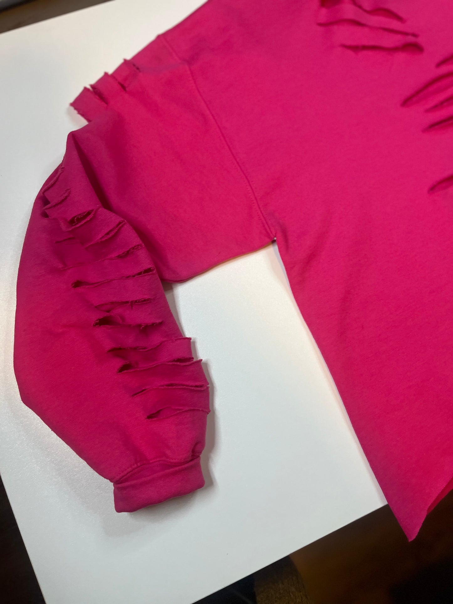 Distressed embellished sweatshirt