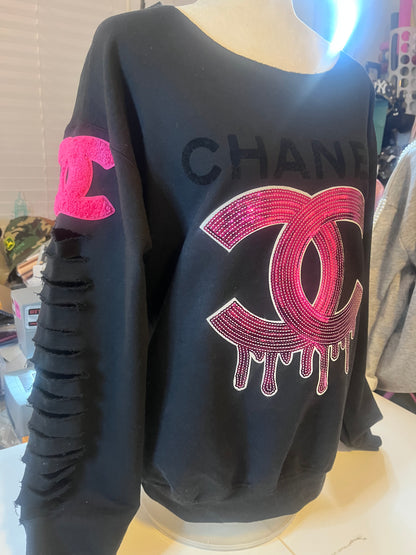 Distressed embellished sweatshirt