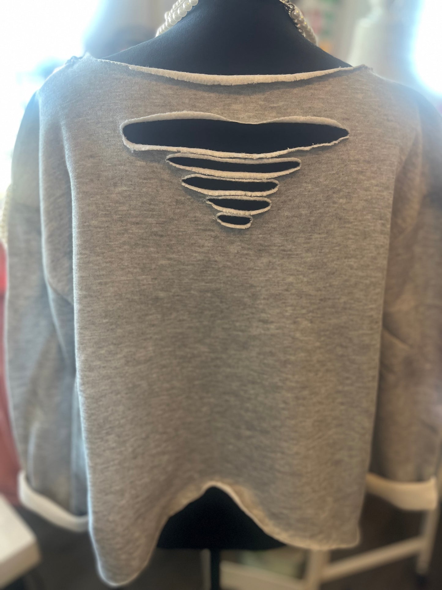 Distressed embellished sweatshirt