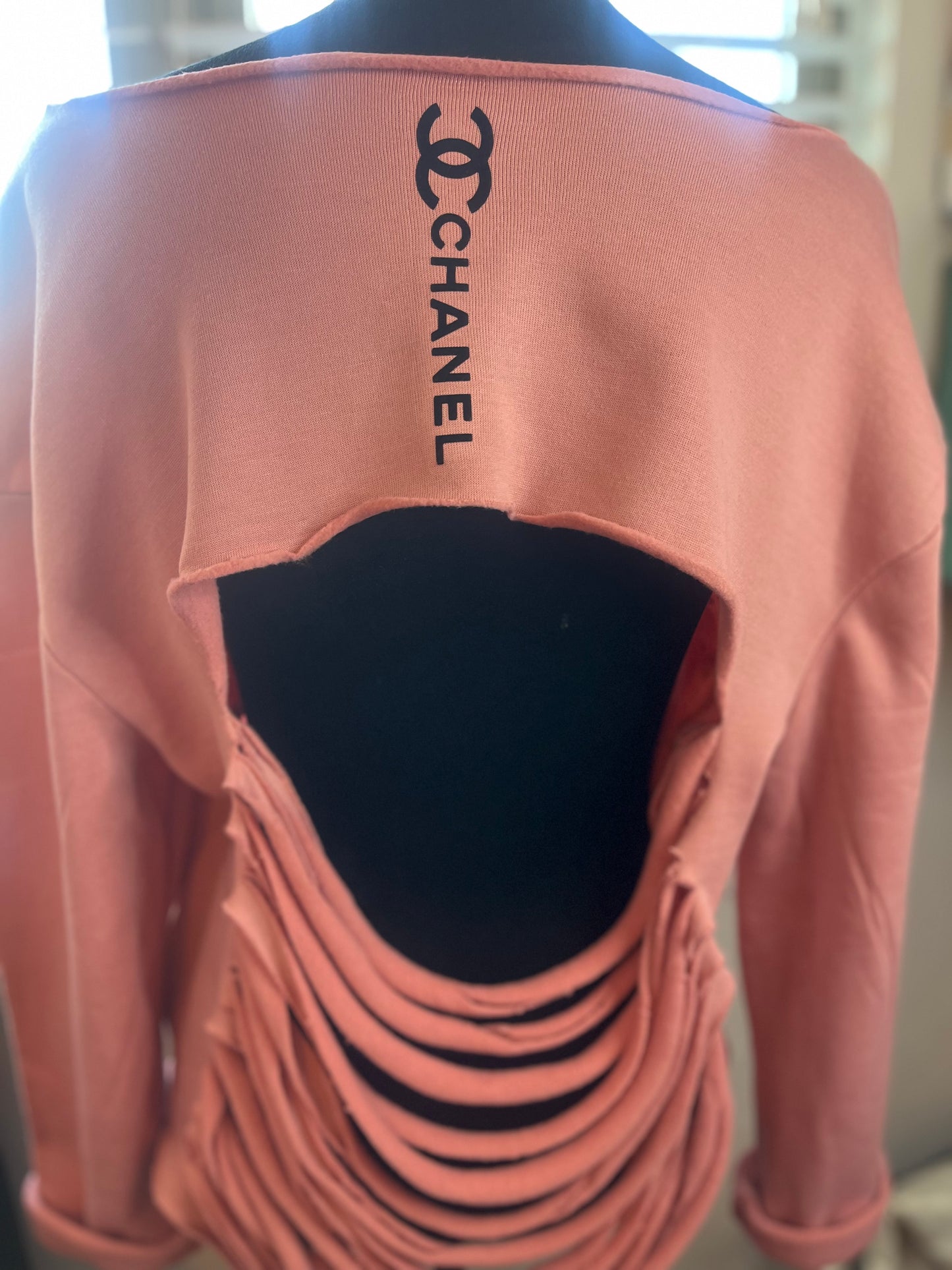 Distressed embellished sweatshirt