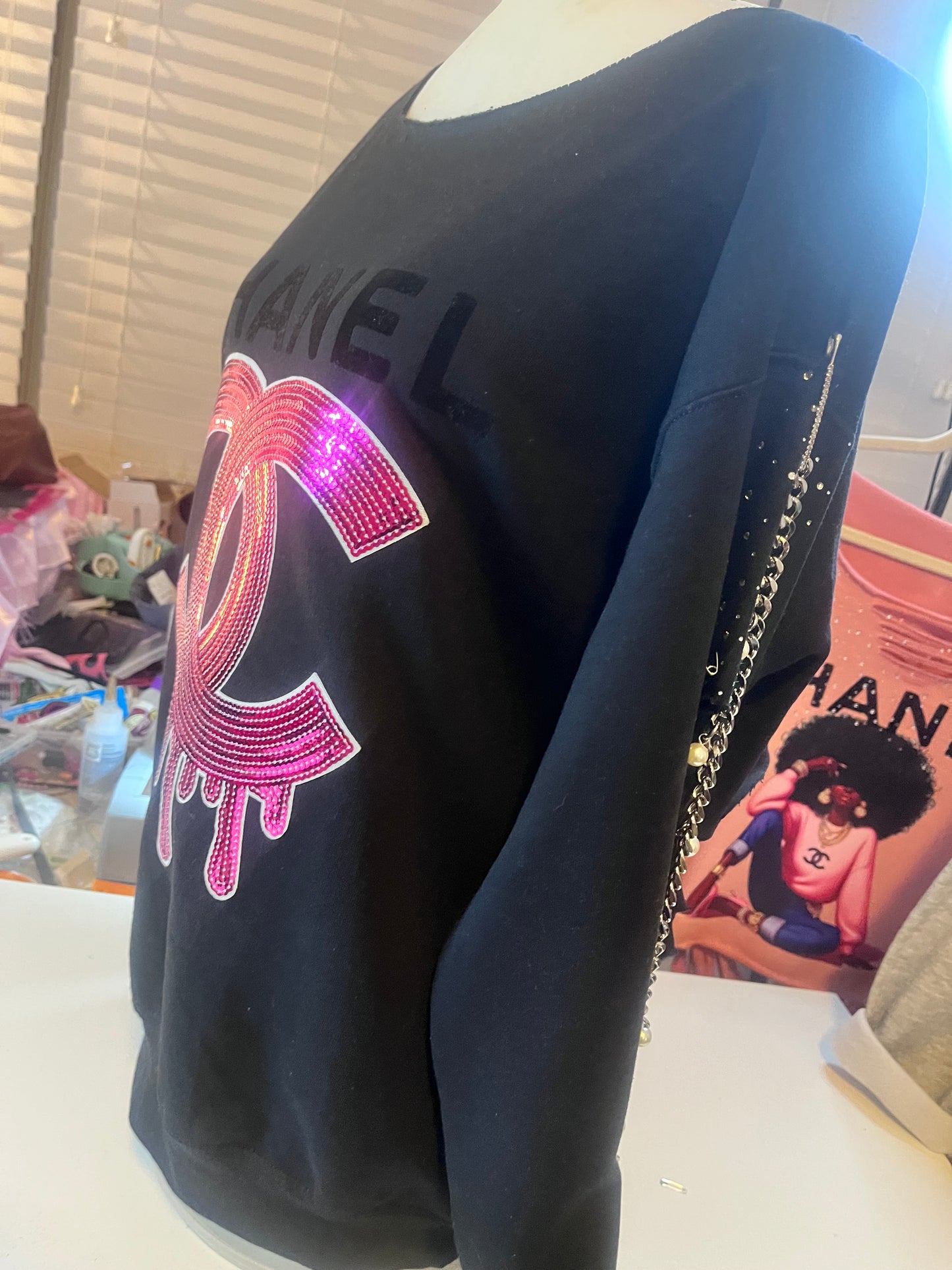 Distressed embellished sweatshirt